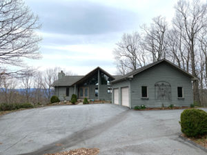 Mountain and lake view home for sale in Connestee Falls